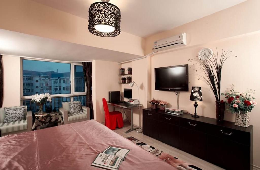 Dalian Yike Yijia Apartment Chambre photo